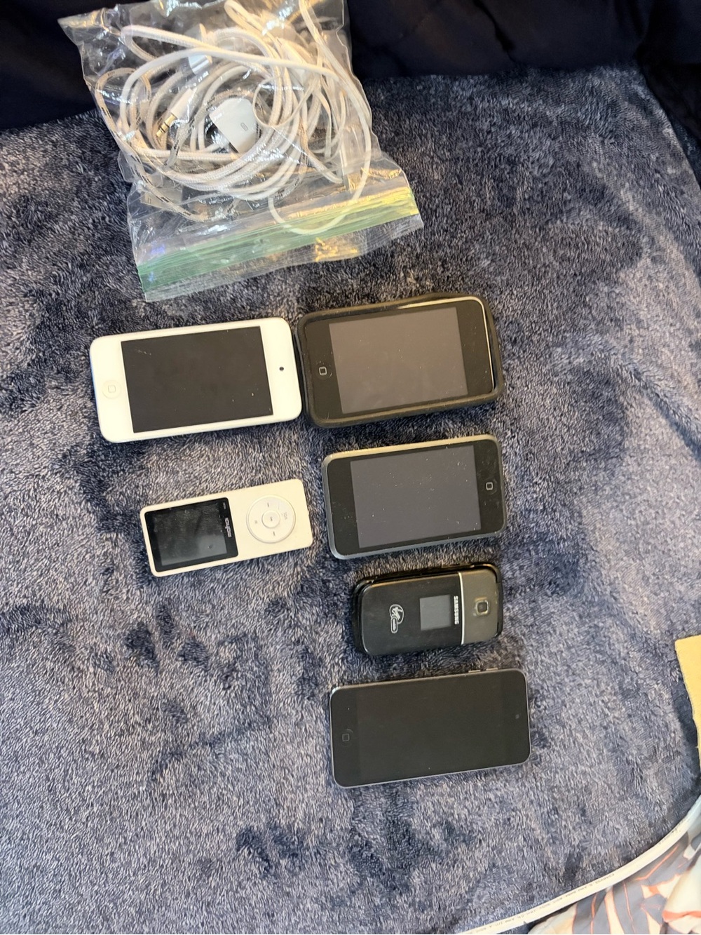 Assorted Black and White Portable Media Players and Cell Phones - Mixed Brand